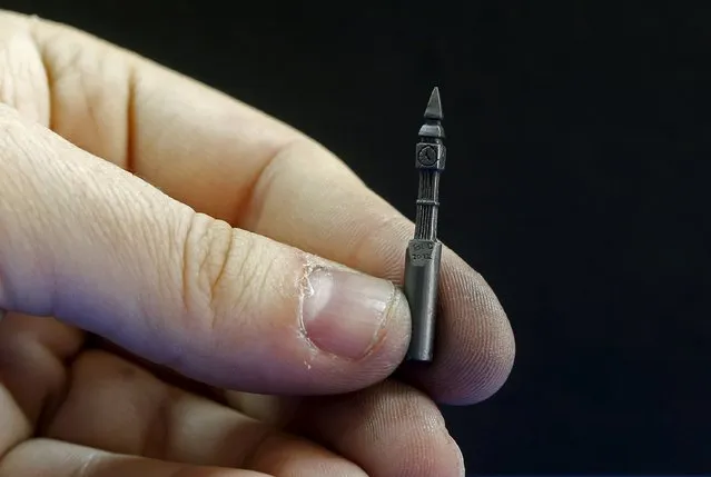 Jadranko Djordjevic, a self-taught artist, shows his miniature sculpture on a graphite pencil in Tuzla, Bosnia and Herzegovina April 26, 2016. (Photo by Dado Ruvic/Reuters)