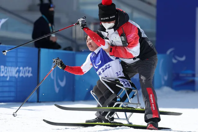 Panpan Li of Team China competes in the Para Cross-Country Skiing Women's Long Distance Sitting during day two of the Beijing 2022 Winter Paralympics at on March 06, 2022 in Zhangjiakou, China. (Photo by Lintao Zhang/Getty Images)
