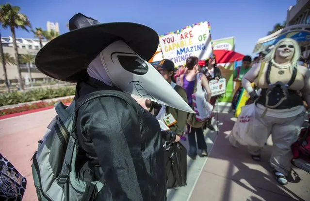 Cosplay enthusiasts are pictured during the 2015 Comic-Con International Convention in San Diego, California July 10, 2015. (Photo by Mario Anzuoni/Reuters)