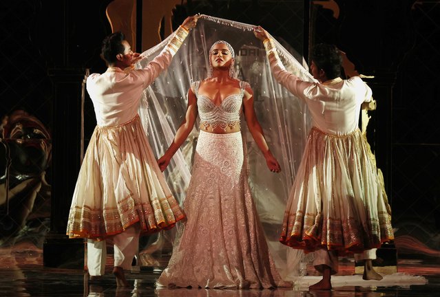 A model presents a creation by designers Abu Jani and Sandeep Khosla during the FDCI India Couture Week 2024 in New Delhi, India, 24 July 2024. The fashion event runs from 24 to 31 July 2024. (Photo by Rajat Gupta/EPA)