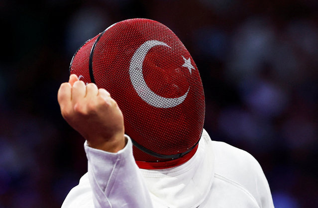 Hakan Akkaya of Turkey reacts during his wheelchair fencing men's epee category A bronze medal bout against Emanuele Lambertini of Italy on September 6, 2024. (Photo by Gonzalo Fuentes/Reuters)