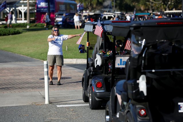 Supporters of Kamala Harris hold a golf cart rally in the retirement community of The Villages, Florida, on October, 14, 2024. (Photo by Octavio Jones/Reuters)