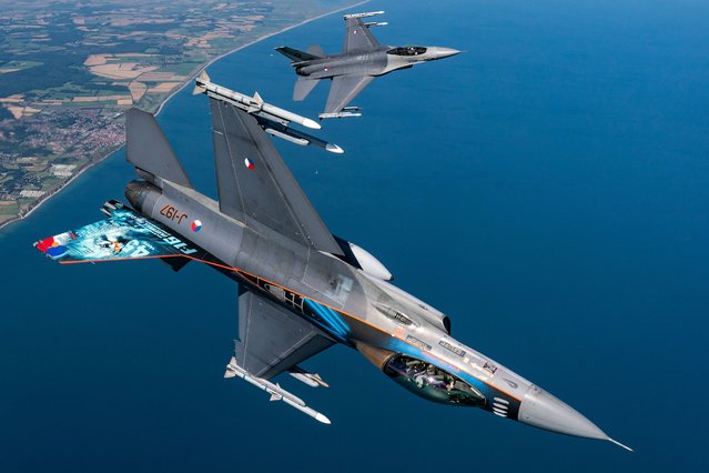 Two Dutch F-16 fighter falcons are seen flying high over Norfolk and East Anglia on August 7, 2024, as they mark their retirement from 45 years of service. The Royal Netherlands Air Force will be retiring the last of their F-16 jets at the end of this month and are being replaced by the F-35A. (Photo by Craig Strawbridge/Story Picture Agency)