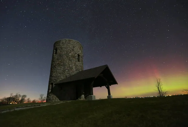 The Northern Lights shine over Pilot Knob State Park near Forest City, Iowa, in the early morning of Tuesday, November 3, 2015. (Photo by Bryon Houlgrave/The Des Moines Register via AP Photo)