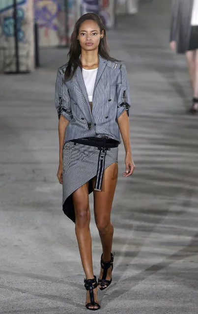 Model Malaika Firth, wears a creation for Anthony Vaccarello's Spring/Summer 2015 ready-to-wear fashion collection, presented in Paris, Tuesday, September 23, 2014. (Photo by Jacques Brinon/AP Photo)