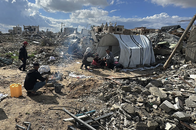 Palestinian Muslim Abu Dhaka, who returned to his home in the city of Khan Yunis with his family after the ceasefire reached between Hamas and Israel, continues his daily life among the rubbles of collapsed houses with his family in the makeshift tent he built on the rubble of his house in Khan Yunis, Gaza on February 05, 2025. (Photo by Doaa Albaz/Anadolu via Getty Images)