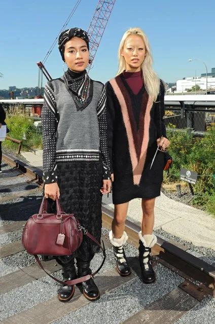 Musician Yuna Zarai (L) and model Sheena Liam attend the Coach Women's Spring 2016 fashion show during New York Fashion Week at The Highline on September 15, 2015 in New York City. (Photo by Brad Barket/Getty Images for Coach)