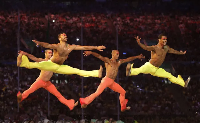 Dancers perform during the closing ceremony in the Maracana stadium at the 2016 Summer Olympics in Rio de Janeiro, Brazil, Sunday, August 21, 2016. (Photo by David Goldman/AP Photo)