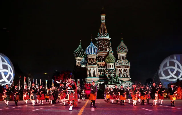 Members of the Celtic Massed Pipes and Drums band perform during the International Military Music Festival “Spasskaya Tower” media preview in Red Square in Moscow, Russia, August 26, 2016. (Photo by Sergei Karpukhin/Reuters)