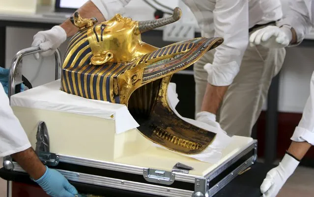 The golden mask of King Tutankhamun is pictured during its restoration process at the Egyptian Museum in Cairo, Egypt, October 20, 2015. (Photo by Mohamed Abd El Ghany/Reuters)