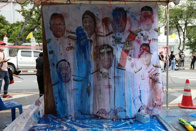 A destroyed mural with government and military leaders is seen during a mass rally in Bangkok, Thailand, September 19, 2020. (Photo by Soe Zeya Tun/Reuters)