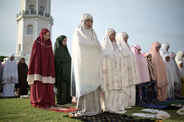 Indonesian Muslim women attend mass prayers at Baiturrahman mosque during Eid al-Adha, in Banda Aceh, Indonesia, on June 6, 2025. (Photo by Riska Munawarah/Reuters)