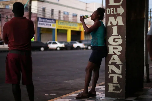 A Congolese migrant intending to seek asylum in the U.S. drinks outside a La Casa del Migrante shelter in Mexicali, Mexico, October 5, 2016. (Photo by Edgard Garrido/Reuters)