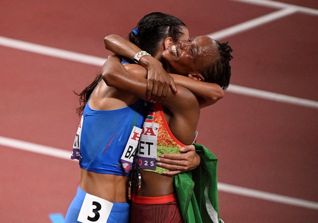 Kenya's Beatrice Chebet celebrates winning the Women's 10,000m Final with second place Italy's Nadia Battocletti on September 13, 2025. (Photo by Dylan Martinez/Reuters)