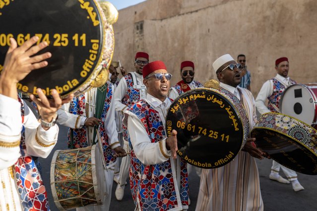 Moroccans play percussion instruments during a procession to commemorate the birth anniversary of the Prophet Muhammad, known in Arabic as Mawlid, in Sale, Morocco, 04 September 2025. Many Muslims around the world celebrate the Prophet Muhammad's birthday every year on 12th of the Rabi-ul-Awal, the third month of the Islamic Calendar, which falls this year on 04 September. (Photo by Jalal Morchidi/EPA)