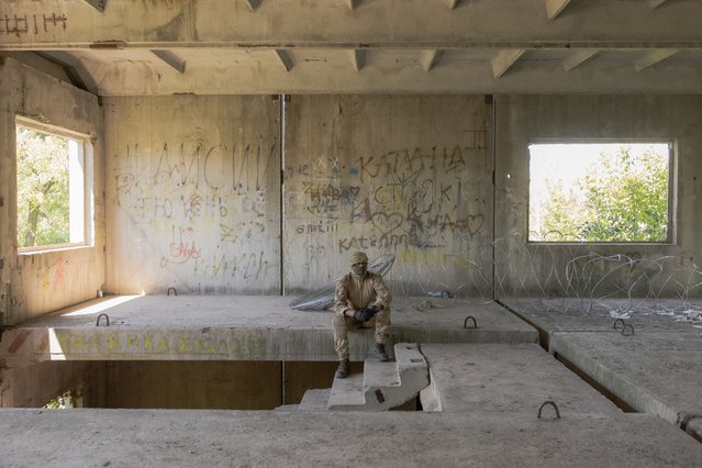 A Ukrainian servicemen of the Spartan Brigade takes part in a combined mental resilience and combat training exercise in the Dnipropetrovsk region on July 14, 2025, amid the Russian invasion of Ukraine. US President Donald Trump has told Russia to end its war in Ukraine within 50 days or face massive new economic sanctions, as he voiced fresh frustration with Moscow and laid out an arrangement with NATO to supply Kyiv with new military aid sponsored by the alliance's member countries. (Photo by Roman Pilipey/AFP Photo)