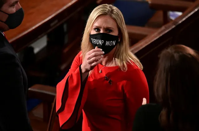 U.S. Rep. Marjorie Taylor Greene (R-GA) wears a “Trump Won” face mask as she arrives on the floor of the House to take her oath of office as a newly elected member of the 117th House of Representatives in Washington, U.S., January 3, 2021. (Photo by Erin Scott/Pool via Reuters)