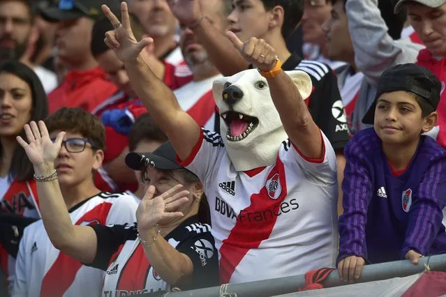 Fans of River Plate cheer before the start a local tournament soccer match against Boca Juniors at Monumental stadium in Buenos Aires, Argentina, Sunday, May 7, 2023. (Photo by Gustavo Garello/AP Photo)