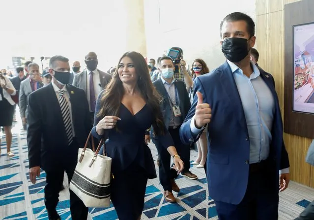 Donald Trump Jr. walks with Kimberly Guilfoyle at the Conservative Political Action Conference (CPAC) in Orlando, Florida, U.S. February 26, 2021. (Photo by Octavio Jones/Reuters)