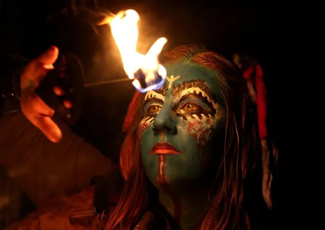 Performers take part in the Beltane Fire Festival an annual participatory arts event and ritual inspired to welcome the coming of summer at Calton Hill, in Edinburgh, Scotland, Britain on April 30, 2022. (Photo by Lee Smith/Reuters)