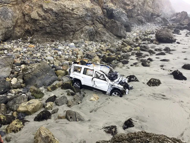 This Friday, July 13, 2018, photo shows the wrecked Jeep belonging to 23-year-old Angela Hernandez of Portland, Ore., after she survived a 250-foot car plunge off a cliff and a week stranded on a remote beach near Big Sur, Calif. (Photo by Chelsea Moore via AP Photo)