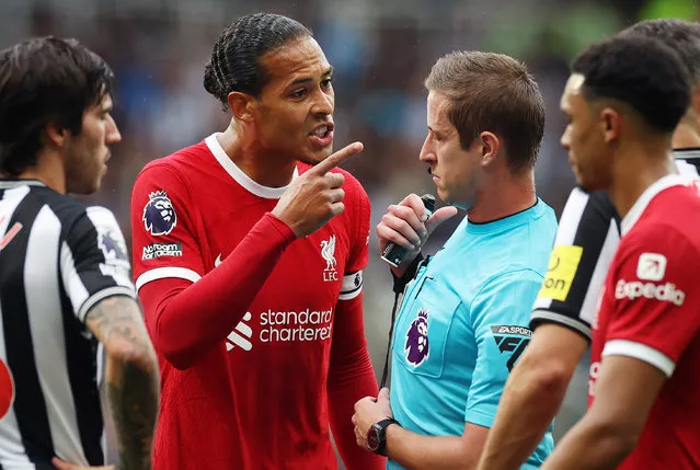 Virgil van Dijk of Liverpool reacts after being shown a red card by referee John Brooks during the Premier League match between Newcastle United and Liverpool FC at St. James Park on August 27, 2023 in Newcastle upon Tyne, England. (Photo by Ian MacNicol/Getty Images)