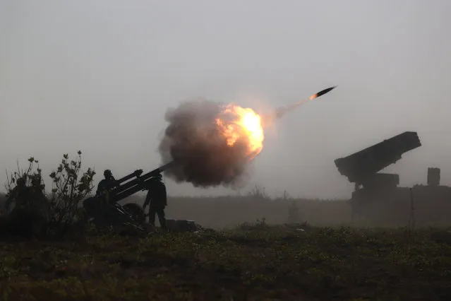 Indonesian Marines fire an artillery round during an amphibious landing operation at the Super Garuda Shield multi-national military exercise in Situbondo, East Java, Indonesia, Sunday, September 10, 2023. Thousands of military personnel from the United States, Indonesia and other allied forces showcased their armor capabilities on Sunday in combat drills on the Indonesian island of Java as China takes more aggressive actions in the region. (Photo by Trisnadi)/AP Photo