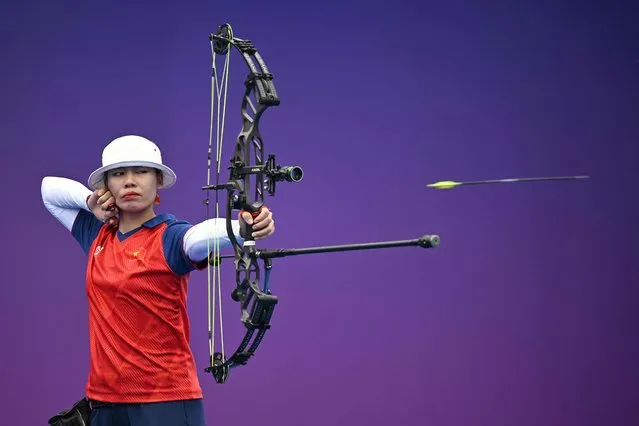 Vietnam's Thi Hai Chau Nguyen competes against South Korea in the archery compound mixed team quarter-final match during the 2022 Asian Games in Hangzhou in China's eastern Zhejiang province on October 4, 2023. (Photo by Jung Yeon-je/AFP Photo)