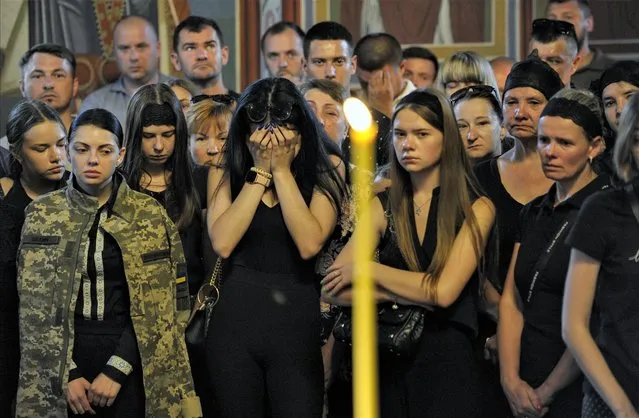 A memorial service for the Ukrainian television host Karim Hulamov, who died while defending Ukraine against Russian invaders, takes place at St Michael’s Cathedral in Kyiv, Ukraine on July 21, 2022. (Photo by Future Publishing/Ukrinform/Getty Images)