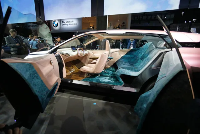 The interior of the BMW Vision iNEXT electric autonomous concept car is displayed during a BMW press conference at the Los Angeles Auto Show in Los Angeles on November 28, 2018. (Photo by Mike Blake/Reuters)