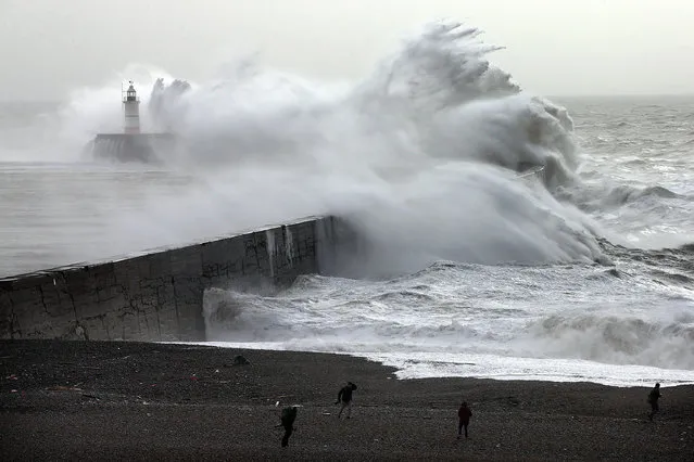 Waves hit a harbour wall on February 8, 2016 in Newhaven, East Sussex, UK on February 8, 2016. Storm Imogen is the ninth named storm to hit the UK this season. This year's storms are being named in an effort by the Met Office and Met Eireann to increase public awareness and safety. They were named by public ballot and there are no names for the letters Q, U, X, Y and Z. (Photo by Carl Court/Getty Images)