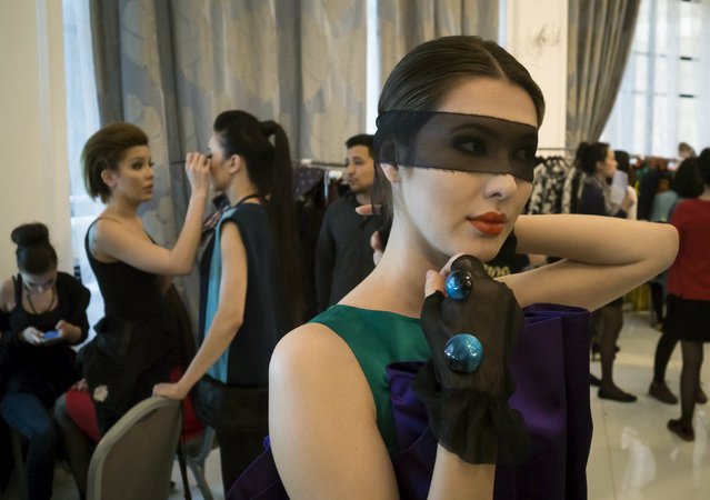 Models get ready backstage during Kazakhstan Fashion Week in Almaty April 16, 2015. (Photo by Shamil Zhumatov/Reuters)
