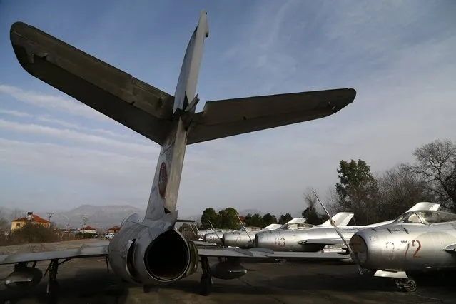  In this photo taken on Monday, February 15, 2016, an Mig-17 and Mig-19 fighter jets stand at the Rinasi air base, near Tirana. If you want to buy a secondhand fighter jet, Albania's the place to go right now. The 40 obsolete Soviet and Chinese-made aircraft up for sale once roared over what was Europe's most exclusive airspace. The Albanian pilots were members of an exalted military elite that had its own food-tasters and was tasked by Communist Albania's paranoid regime with deterring countless enemies who never did come to this country on the Adriatic Sea. (Photo by Gent Shkullaku/AP Photo)