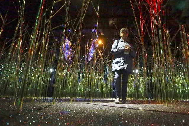 A visitor walks through the Swarowski Crystal World museum on its reopening day following renovation, in the western Austrian village of Wattens April 30, 2015. (Photo by Dominic Ebenbichler/Reuters)