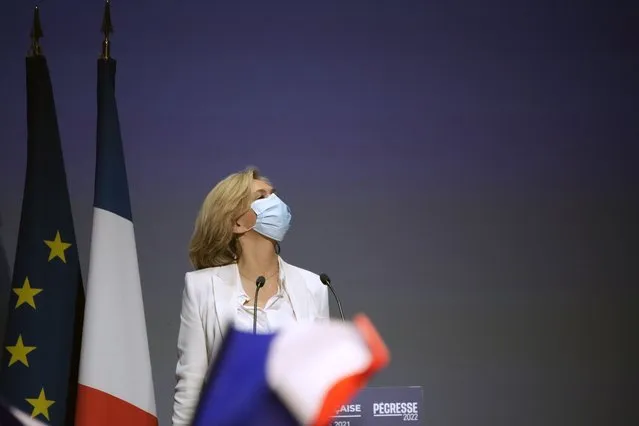 Valerie Pecresse, candidate for the French presidential election 2022, arrives to deliver a speech during a meeting in Paris, France, Saturday, December 11, 2021. The first round of the 2022 French presidential election will be held on April 10, 2022 and the second round on April 24, 2022. (Photo by Christophe Ena/AP Photo)