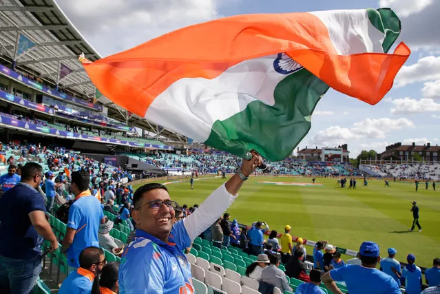 An India fan waves a flag before the Group Stage match of the ICC Cricket World Cup 2019 between India and Australia at The Oval on June 9, 2019 in London, England. (Photo by Henry Browne/Getty Images)