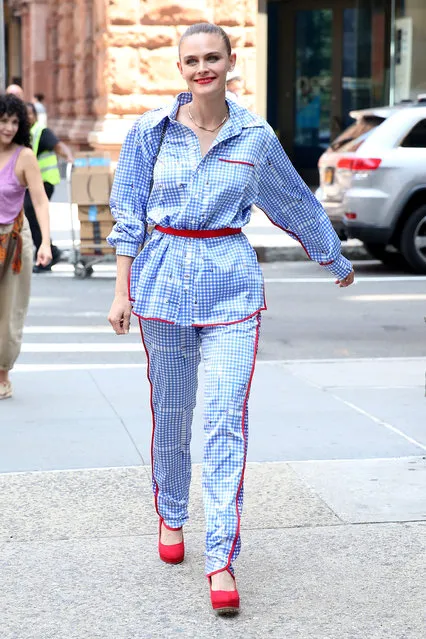 Actress Emily Deschanel, wearing blue striped jumpsuit, leaves Build Series in New York City on July 16, 2019. (Photo by Christopher Peterson/Splash News and Pictures)