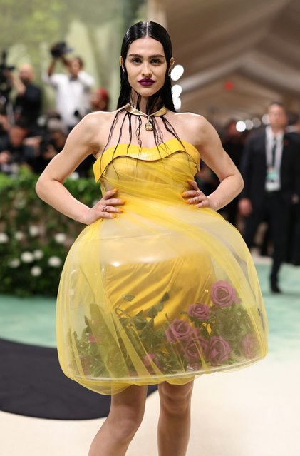 American model and television personality Amelia Gray Hamlin poses at the Met Gala, an annual fundraising gala held for the benefit of the Metropolitan Museum of Art's Costume Institute with this year's theme “Sleeping Beauties: Reawakening Fashion” in New York City, New York, U.S., May 6, 2024. (Photo by Andrew Kelly/Reuters)
