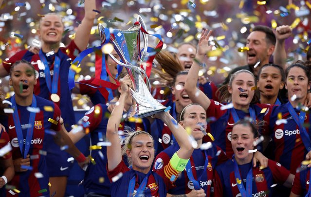 FC Barcelona's Alexia Putellas lifts the trophy as she celebrates with teammates after winning the women's Champions League following their match against Olympique Lyonnais in Bilbao, Spain on May 25, 2024. (Photo by Albert Gea/Reuters)