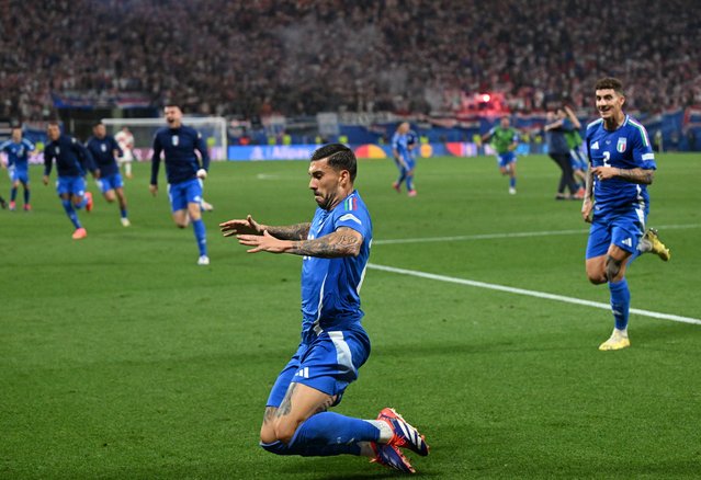 Italy's Mattia Zaccagni celebrates scoring their first goal against Croatia in their Group B match on June 24, 2024. (Photo by Angelika Warmuth/Reuters)