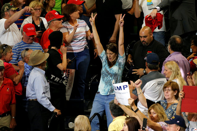Police remove a protester during a rally by Republican U.S. presidential candidate Donald Trump and his supporters in Albuquerque, New Mexico, U.S. May 24, 2016. (Photo by Jonathan Ernst/Reuters)