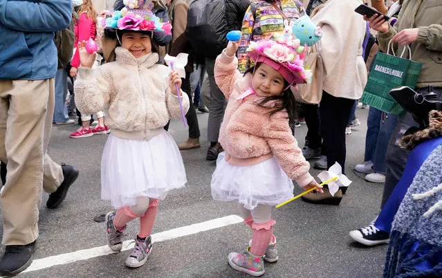 Children attend the annual Easter Parade and Bonnet Festival on Fifth Avenue in front of St. Patrick's Cathedral in New York City on April 17, 2022. (Photo by Timothy A. Clary/AFP Photo)