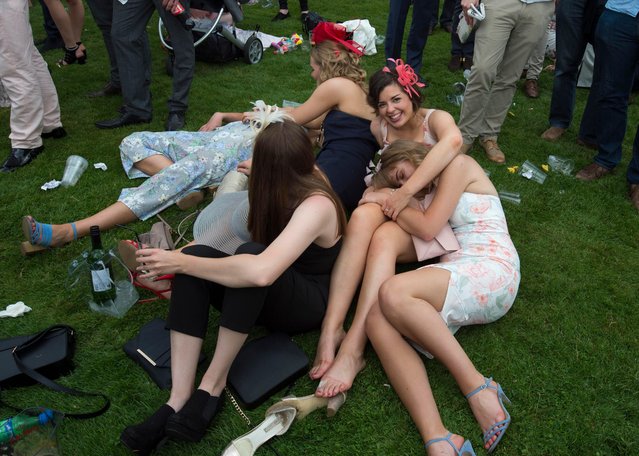 Race goers are pictured during the Investec Ladies Day at Epsom Downs Racecourse on June 2, 2017 in Epsom, England. (Photo by News Group Newspapers Ltd)