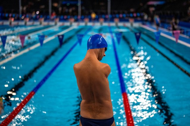 Paralympic athlete Yaroslav Semenenko, of Ukraine, stands next to the pool during a warm up session ahead of the competition, during the 2024 Paralympics, Monday, September 2, 2024, in Paris, France. (Photo by Emilio Morenatti/AP Photo)