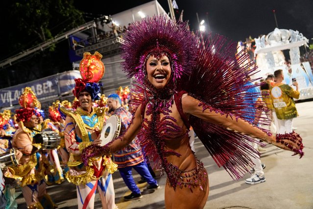 Drum queen Sabrina Sato, from Vila Isabel samba school, performs during Carnival celebrations at the Sambadrome in Rio de Janeiro, Brazil, early Tuesday, February 13, 2024. (Photo by Silvia Izquierdo/AP Photo)