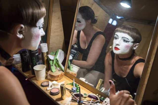 A photo made available 07 August 2015 of members of the Ukrainian group “Dakh Daughters Band” preparing for their performance at the “Seebuehne” (lit: Lakeside stage) within the “Zuercher Theater Spektakel” (Zurich Theatre Spectacle) at the “Landiwiese” venue in Zurich, Switzerland, late 06 August 2015. The international theater and performing arts festival runs from 06 to 23 August 2015. (Photo by Dominic Steinmann/EPA)