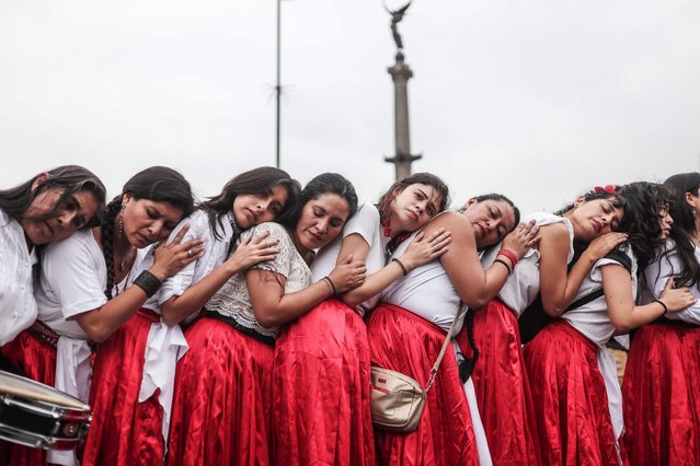 Protesters march to demand the resignation of the President and the closure of Congress in Lima, Peru, 19 July 2023. The day of anti-government protests called for this 19 July in Peru by social, union, and political organizations began calmly and without major incidents in Lima and other regions of the country. (Photo by Aldair Mejia/EPA)