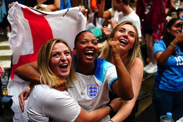 England fans celebrate the second England goal scored by Lauren Hemp during a screening of the FIFA Women's World Cup 2023 semi-final between Australia and England at BOXPARK Wembley, London on Wednesday, August 16, 2023. (Photo by Victoria Jones/PA Images via Getty Images)