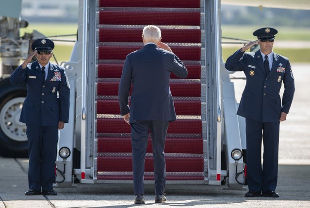 President Joe Biden returns a salute as he boards Air Force One at Andrews Air Force Base, Md., Friday, September 9, 2022, on his way to the groundbreaking of the new Intel semiconductor manufacturing facility in New Albany, Ohio. (Photo by Gemunu Amarasinghe/AP Photo)