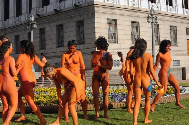 Women with body paintings take part in a demo in favour of the legalization of abortion in front of the Congress building in Montevideo on September 25, 2012. The Congress is voting a law project which would decriminilize the interruption of pregnancy under certain conditions, including obliging women to set out before a tribunal the reasons for the abortion.  AFP PHOTO/Miguel ROJO        (Photo credit should read MIGUEL ROJO/AFP/GettyImages)